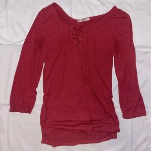 Heart hips, Lace up v shape, red long sleeve top. Medium.